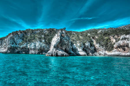 rocky shore in Orosei Gulf. Hdr toneの写真素材