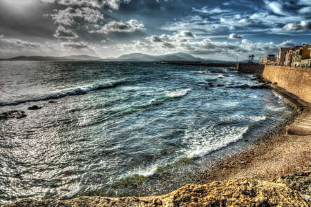 dramatic sky over Alghero. hdr tone.の写真素材
