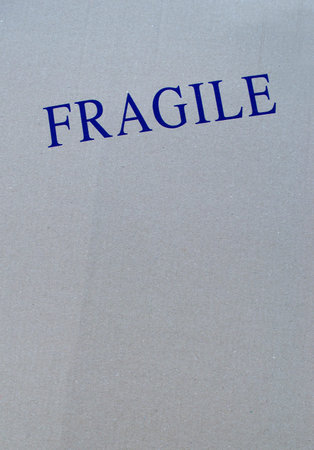fragile written on a cardboardの写真素材