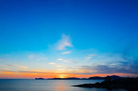sunset by Alghero coastline, Sardiniaの写真素材