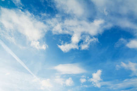 blue sky with white cloudsの写真素材