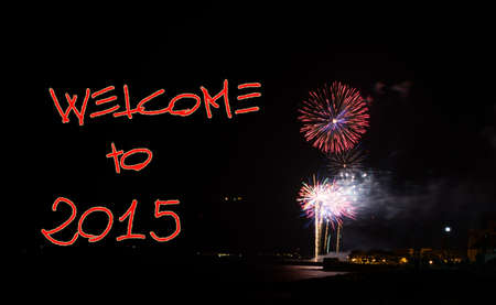 "welcome to 2015" written in the night with fireworksの写真素材