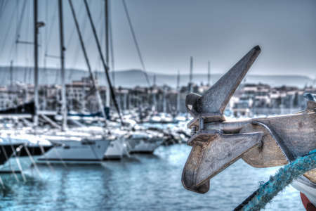 Close up of a boat anchor in Alghero harbor. Heavy processes for hdr tone mapping effect.の写真素材