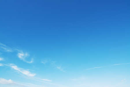 Small clouds in the blue sky. Shot in Alghero, Italyの写真素材