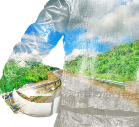 double exposure of a biker and winding road on white backgroundの写真素材