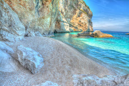 Cala Mariolu rocks by the sea. Hdr tone mapping effectの写真素材