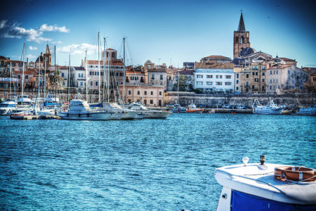 Alghero harbor on a clear spring day. Processed for hdr tone mapping effectの写真素材