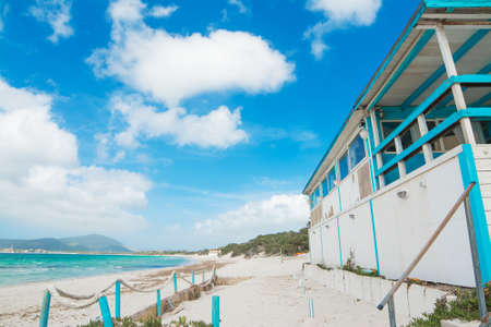 white and blue beach bar by the shoreの写真素材