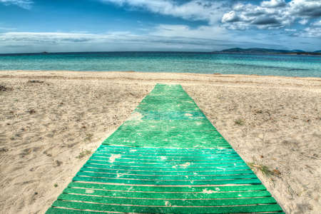 green footpath to the beach. Shot in Sardinia,Italy. Processed for hdr tone mapping effectの写真素材