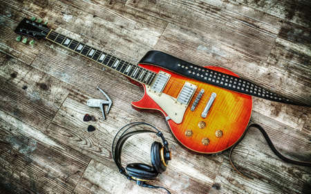 guitar and headphones in hdr tone mapping effectの写真素材