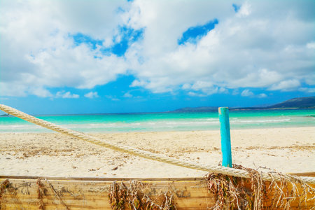turquoise  pole in Maria Pia beach, Sardiniaの写真素材