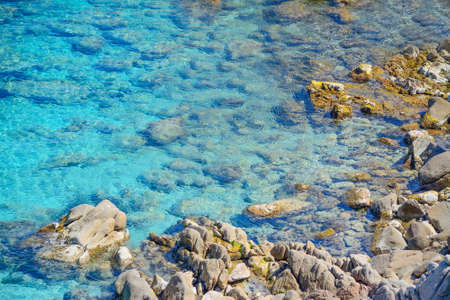 rocks in Capo Testa clear water, Sardiniaの写真素材