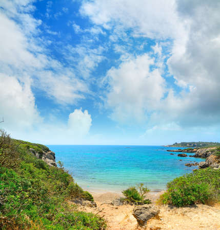 cloudy sky over Alghero shoreline, Sardiniaの写真素材