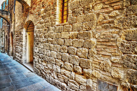 narrow street in San Gimignano, Italyの写真素材