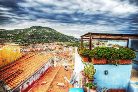 Bosa under a dramatic sky in hdr tone mapping effectの写真素材