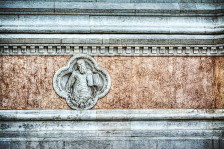 close up of a small statue in San Petronio facade, Bologna,の写真素材