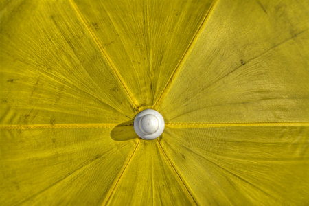 yellow parasol seen from above in hdr tone mapping effectの写真素材