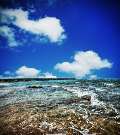 foreshore under clouds in hdr tone mapping effectの写真素材