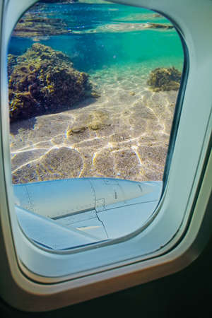 sea floor seen from an airplane porthole after an accidentの写真素材