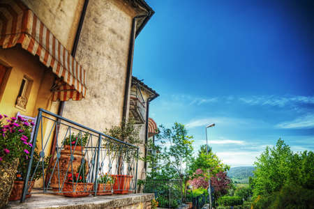 typical corner of San Gimignano in hdr, Italyの写真素材