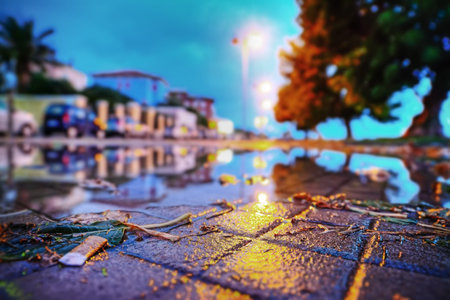 cigarette butt on a sidewalk at sunset