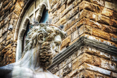 close up of Neptune statue head in Piazza della Signoria in Florence, Italyの写真素材