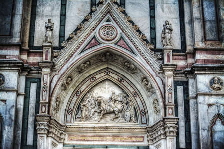 detail of Santa Croce cathedral facade in Florence, Italyの写真素材