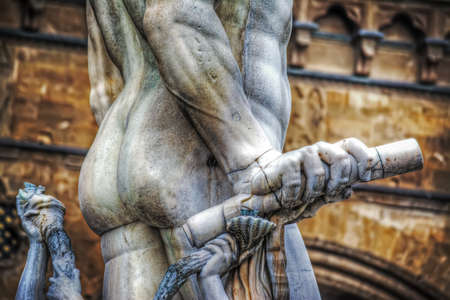 close up of Neptune hand with rod in Piazza della Signoria in Florence, Italyの写真素材