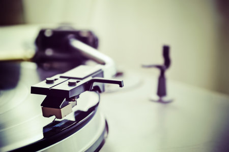 record player stylus on a rotating discの写真素材