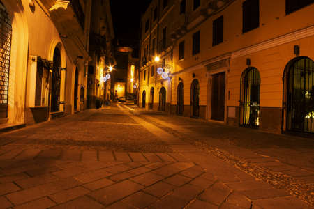 Alghero old town by night, Italyの写真素材