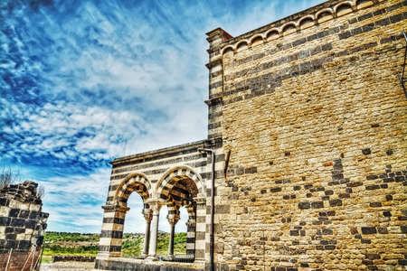 Saccargia cathedral under a dramatic sky, Sardiniaの写真素材