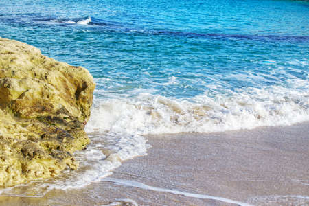 big rock by the shore in Sardinia, Italyの写真素材