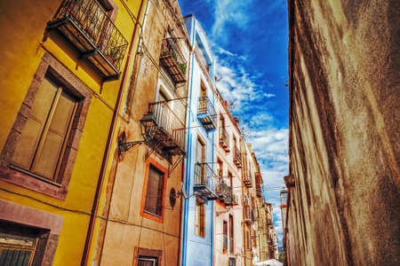 narrow street in Bosa, Italyの写真素材