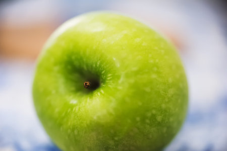 extreme close up of a green apple