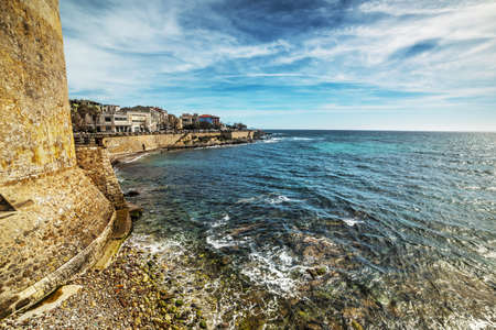Alghero shoreline seen from the seafront, Sardiniaの写真素材