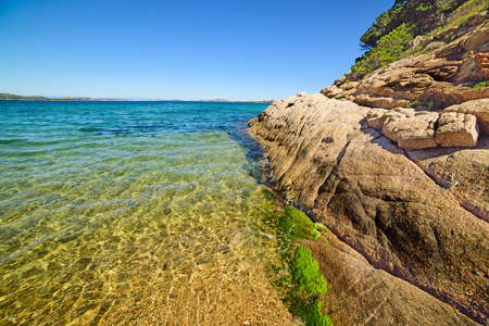 brown rock in Cala dei Ginepri, Sardiniaの写真素材