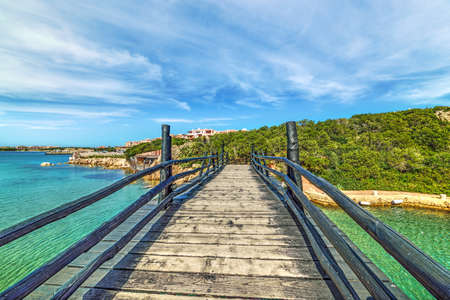 Small wooden bridge in Porto Cervo, Sardiniaの写真素材