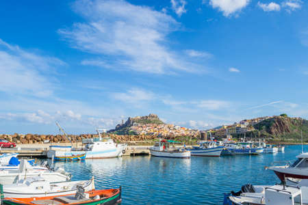 Castelsardo harbor on a clear day, Sardiniaの写真素材