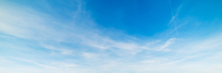 blue sky with white, soft clouds