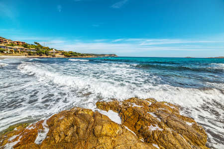 Rough sea in Piccolo Pevero beach in Italyの写真素材