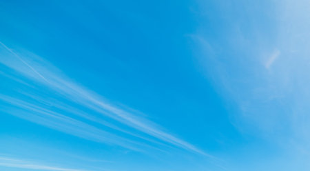 blue sky with white, soft clouds