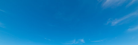 blue sky with white, soft clouds