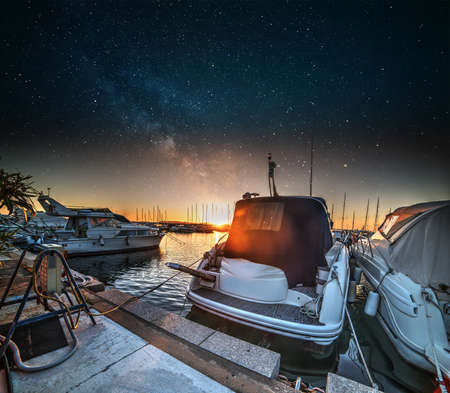 Starry night over Alghero harbor, Italyの写真素材