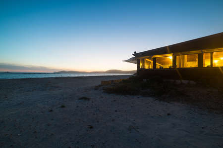 beach bar on a clear night in Alghero, Sardiniaの写真素材