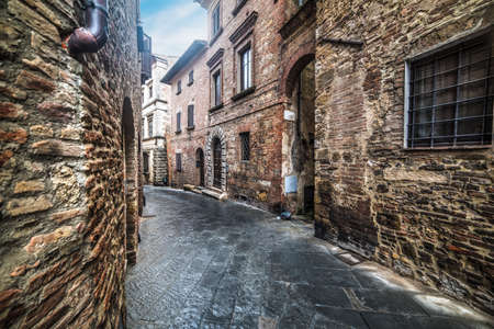 narrow alley in Montepulciano, Italyの写真素材