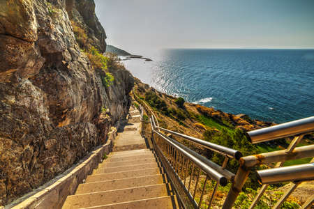 stairway to the sea in Sardinia, Italyの写真素材