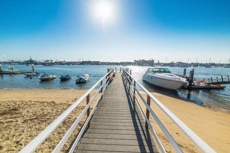 Sun shining over Balboa island, Californiaの写真素材