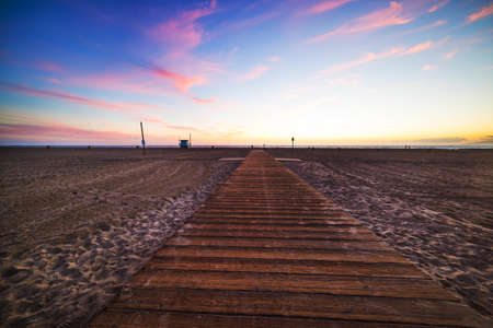 wooden boardwalk in Santa Monica, Californiaの写真素材