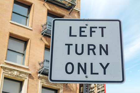 LEFT TURN ONLY sign in Los Angeles, Californiaの写真素材