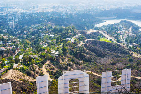 LOS ANGELES, CALIFORNIA - OCTOBER 27, 2016: Hollywood sign seen from behind with Los Angeles on the backgroundのeditorial素材